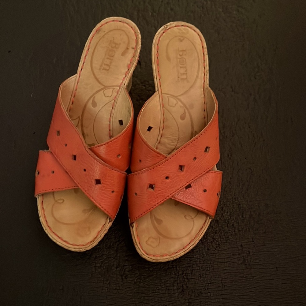 Born sandals, size 7, Coral it’s in between red and orange in color.